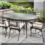 L07. Brown Jordan Elegance glass topped dining table and 6 chairs. 29” x 71”w x 47”d 
